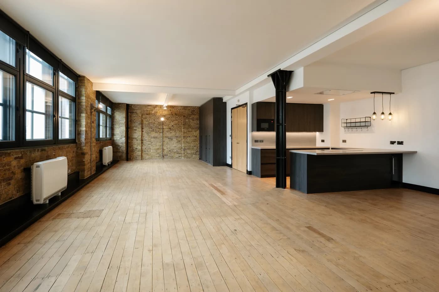 Open-plan living space after renovation by Alico Engineering