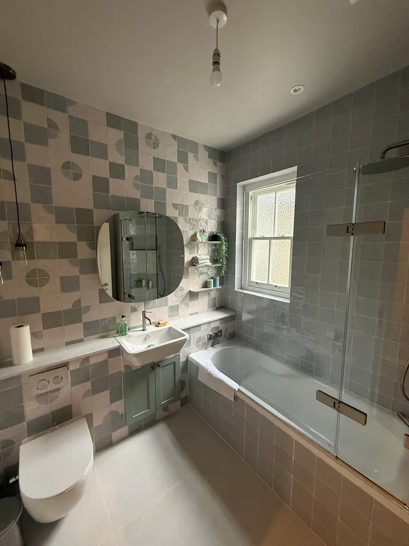 Refurbished bathroom with feature tiling