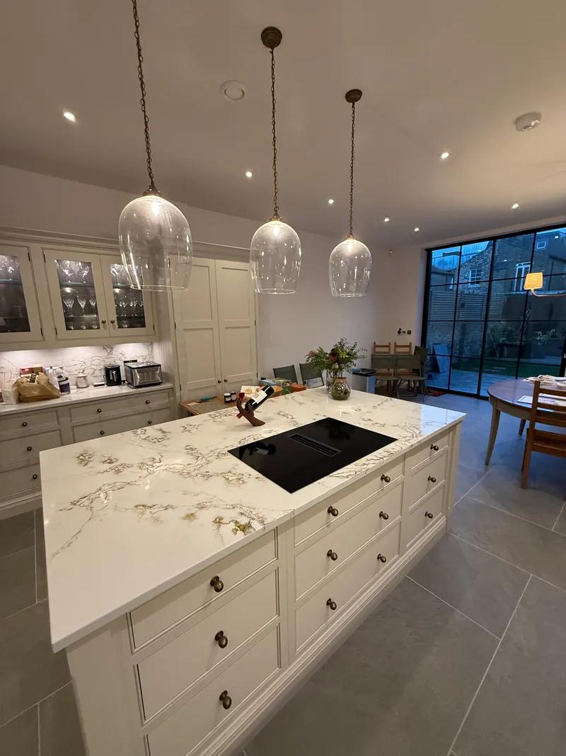 Renovated bespoke kitchen with marble island
