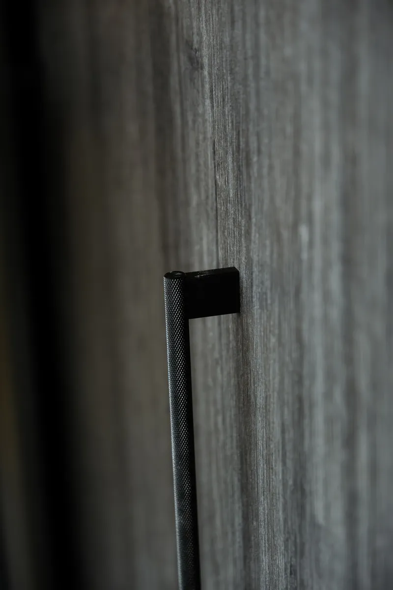 Bespoke timber joinery with blackened hardware